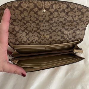 Coach tan/ neutral leather wallet and cosmetic bag
